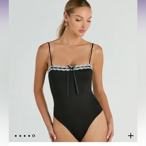 Sleeveless lace trim bow bodysuit